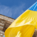 Кадри, які увійшли в історію: як у Києві підіймали державні прапори, – ФОТО